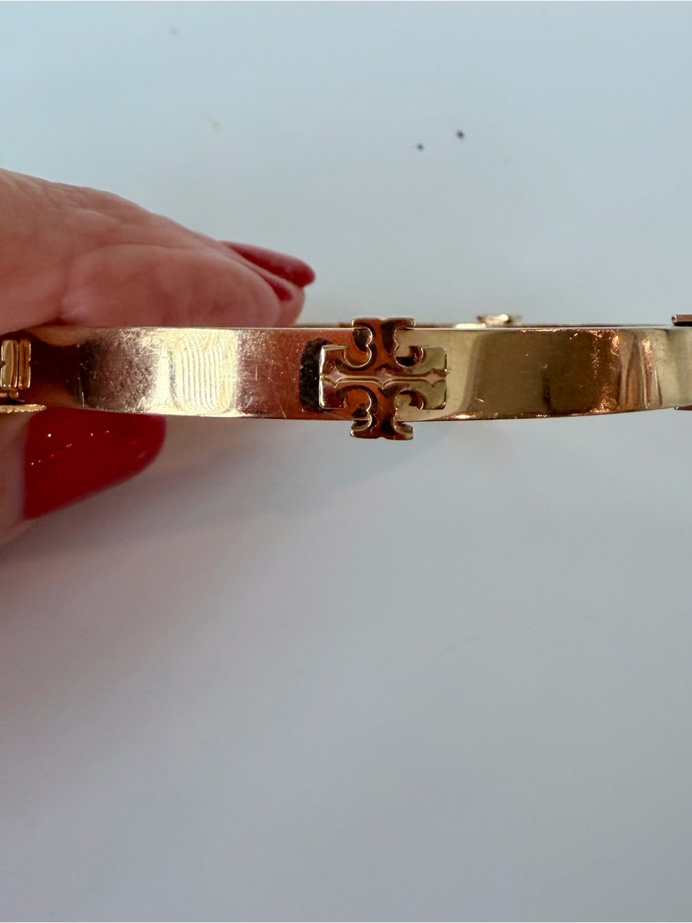 Tory Burch Gold Tone Hinged Bangle Bracelet